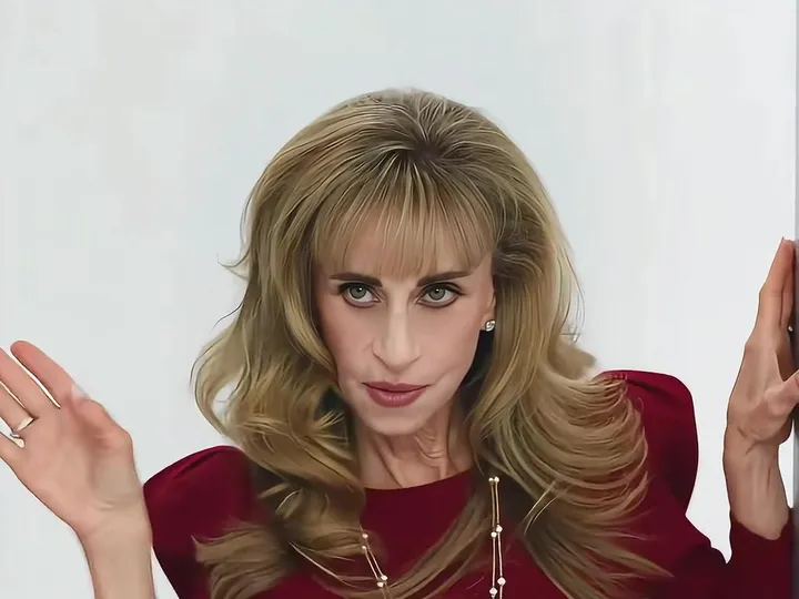 80s Power Dress: A wine-red shoulder-pad dress and red heels, the diva version